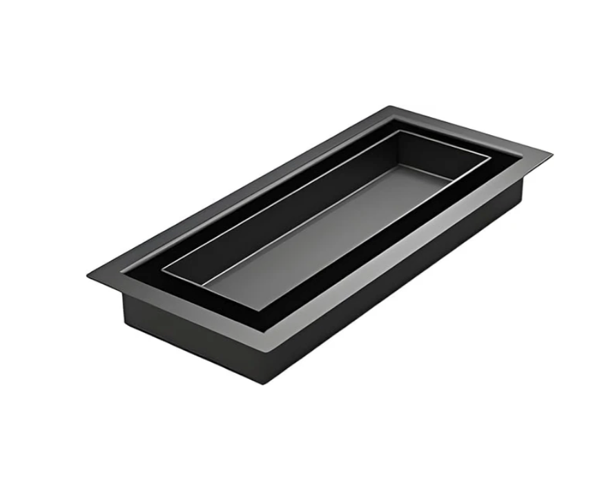 Black metal drop-in floor vent being cleaned and reinstalled