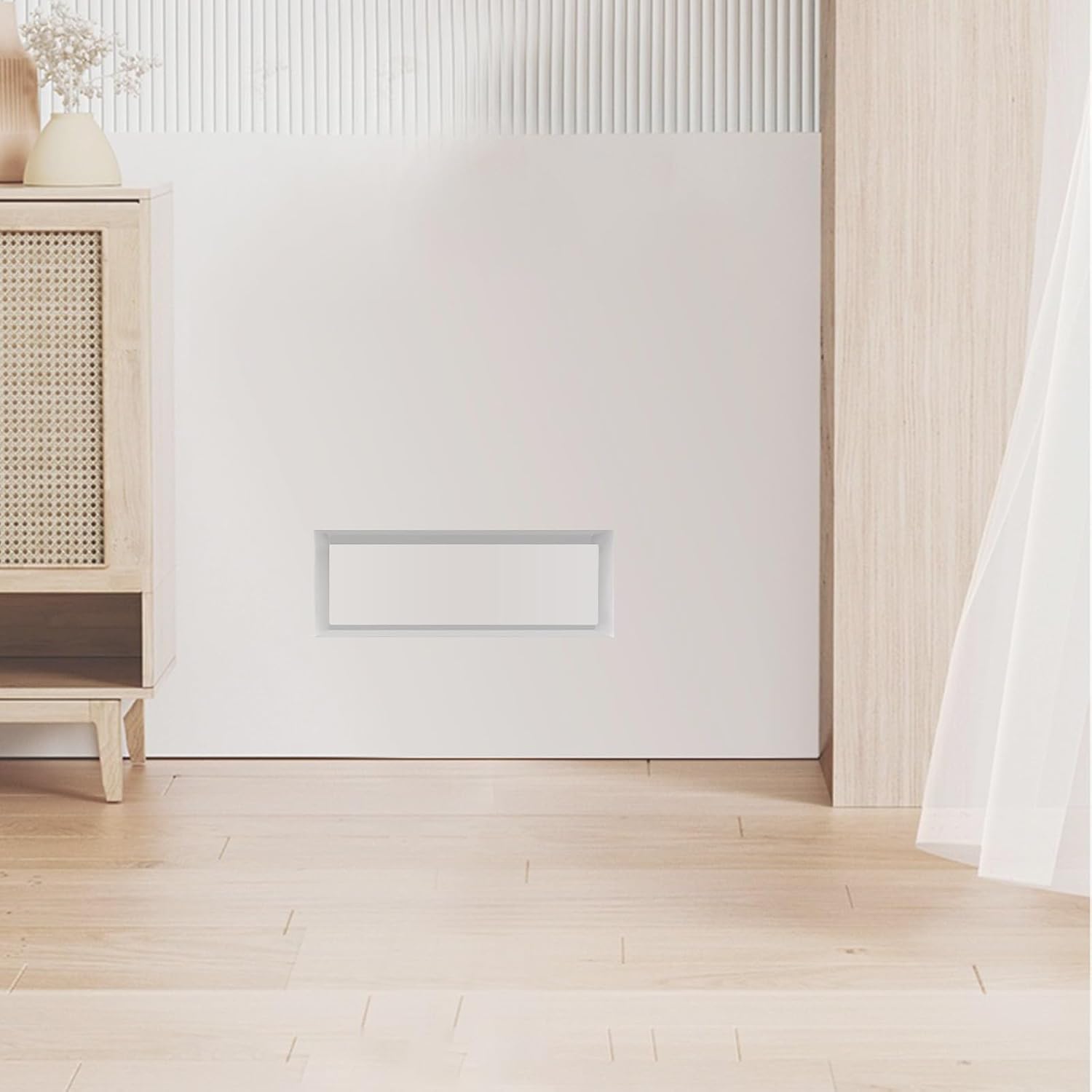Modern flush wall vent mounted on a wall in a minimalistic room with wooden floor and furniture - Khan Supply CO