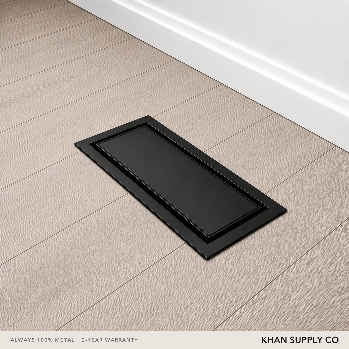 Upgraded 2-in-1 drop-in vent installed flush against baseboard in light hardwood — Khan Supply CO